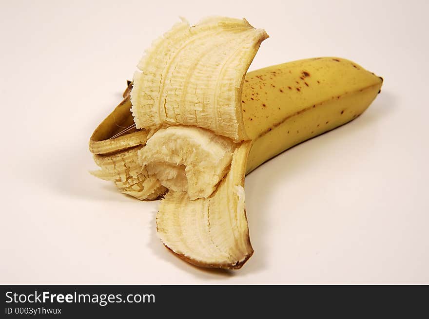 Photo of Peeled Banana With Piece Missing. Photo of Peeled Banana With Piece Missing