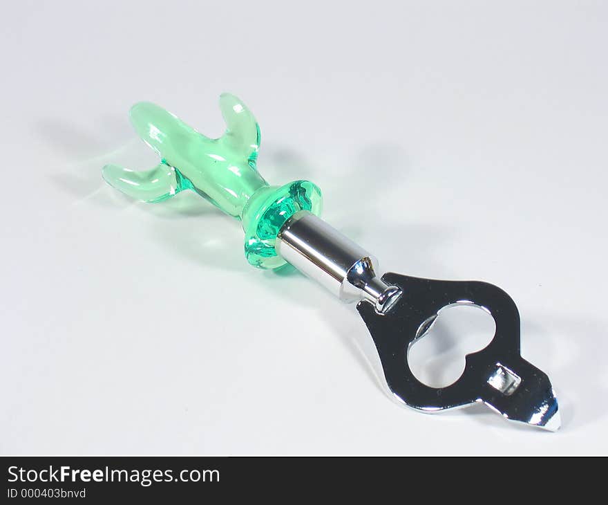 Bottle opener with a green plastic cactus haft. Bottle opener with a green plastic cactus haft.