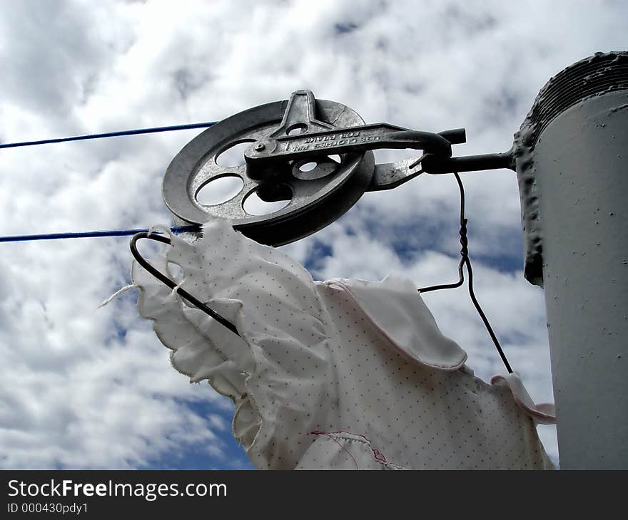 Abstract View of Clothes line, with clouds in the background