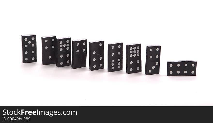 Full set of fours in a double nines set of dominoes. Double fours are laying on their side. Full set of fours in a double nines set of dominoes. Double fours are laying on their side