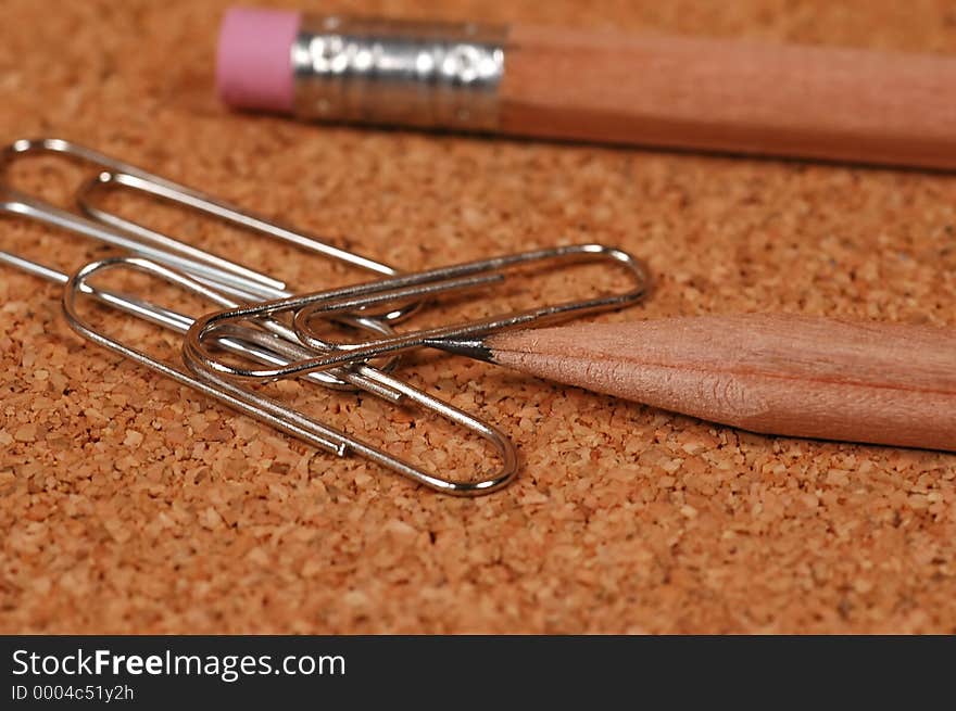 Photo of Pencil and Paperclips.