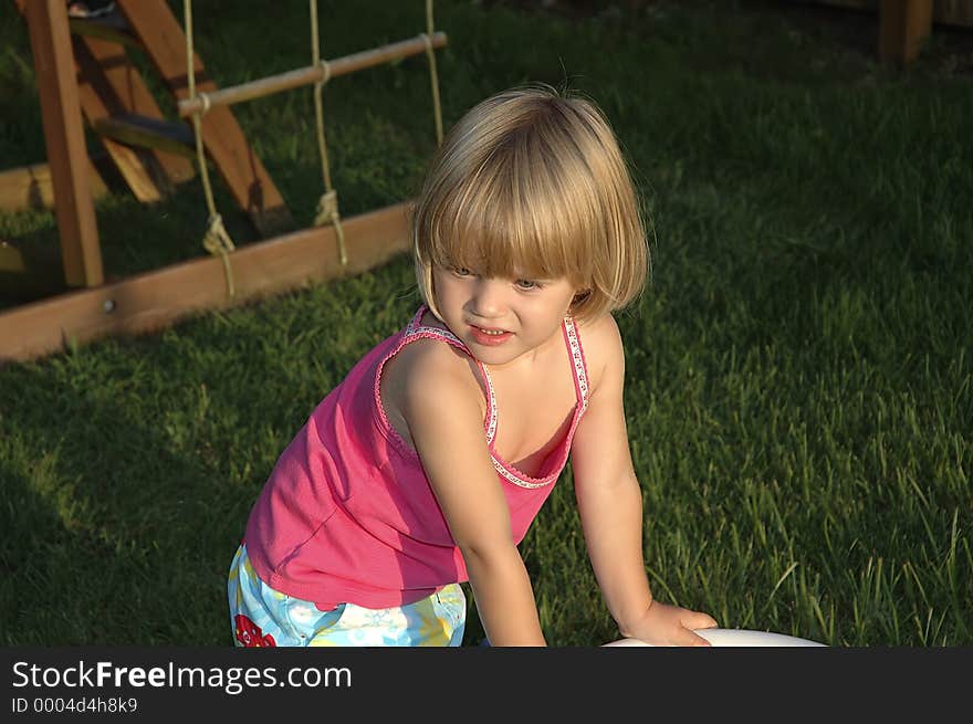 Photo of Young Girl Outdoors at Sunset. Photo of Young Girl Outdoors at Sunset.