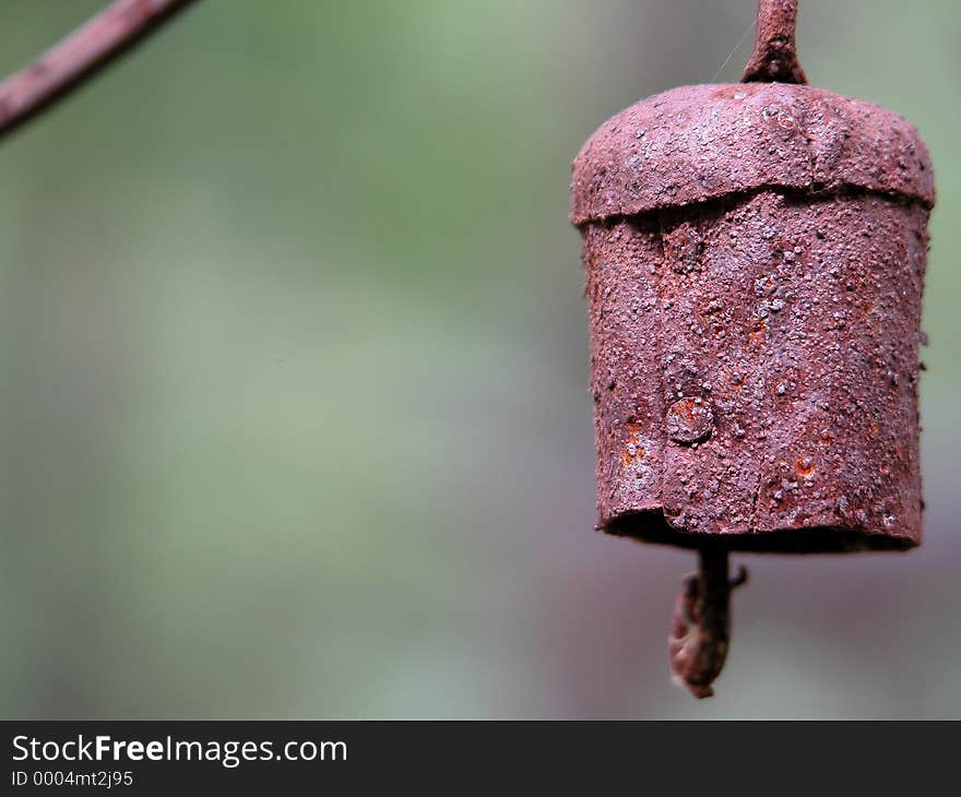 A rusty chime hanging in my yard