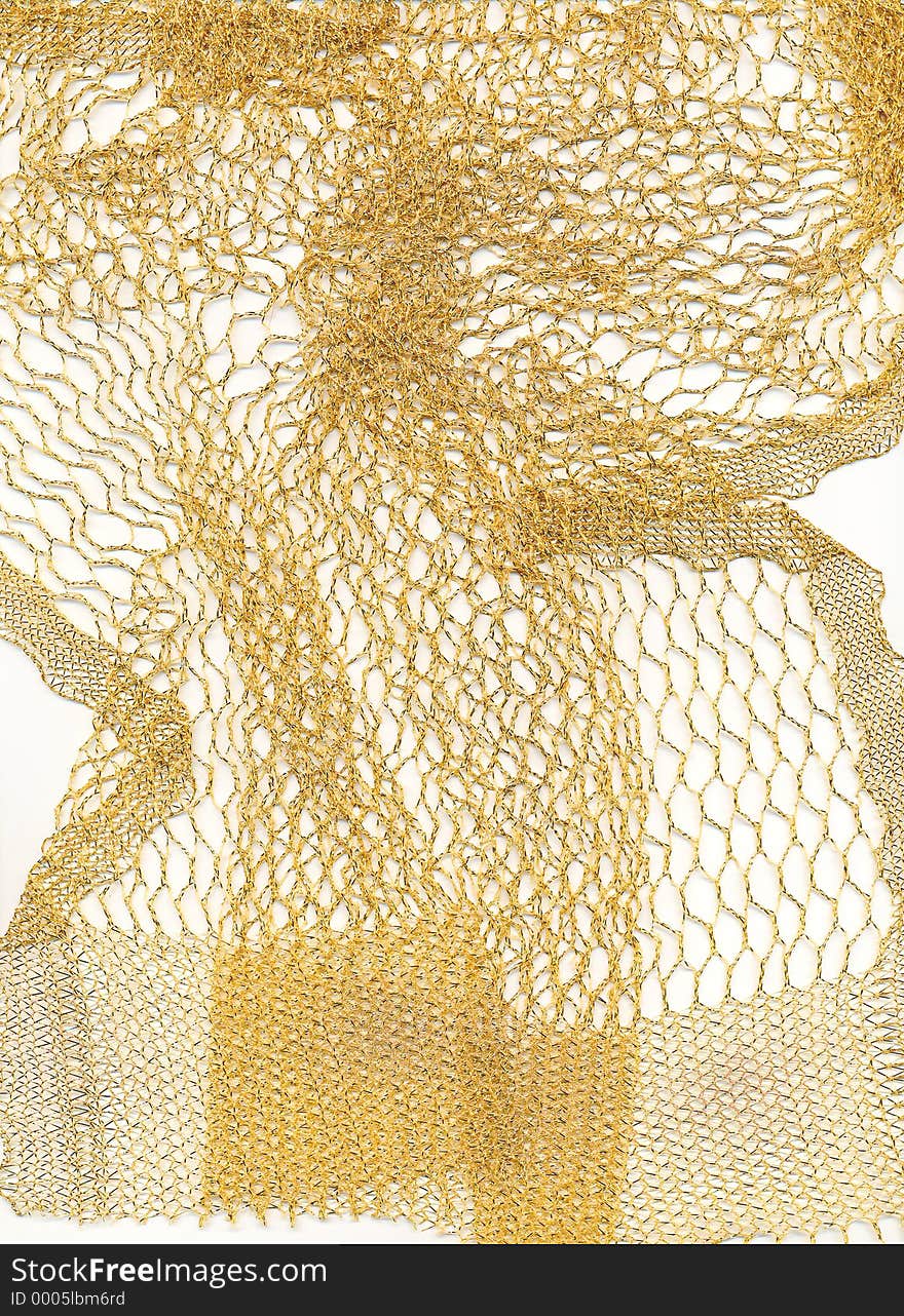 Scarf of gold mesh; could be used in backgrounds. Scarf of gold mesh; could be used in backgrounds