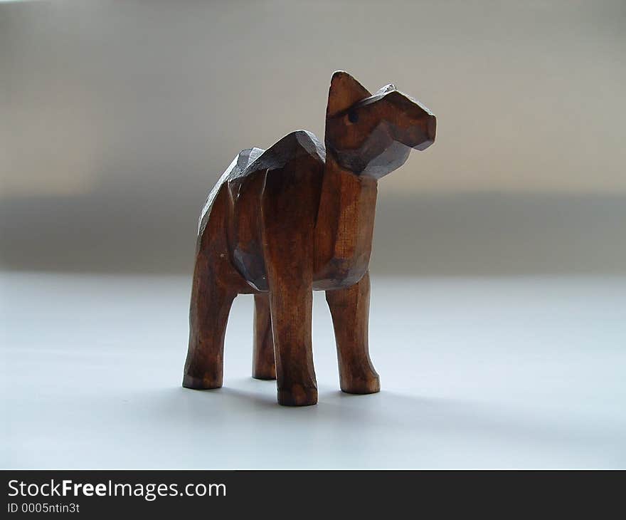 Small wooden statue of a camel. Small wooden statue of a camel.