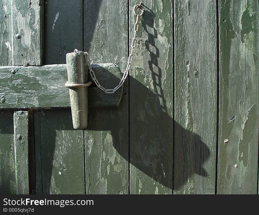 wooden lock at a farm building. wooden lock at a farm building