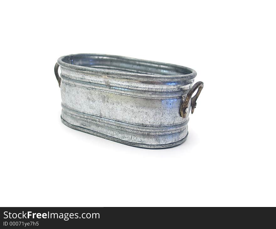 A miniature pail on a white background. A miniature pail on a white background.