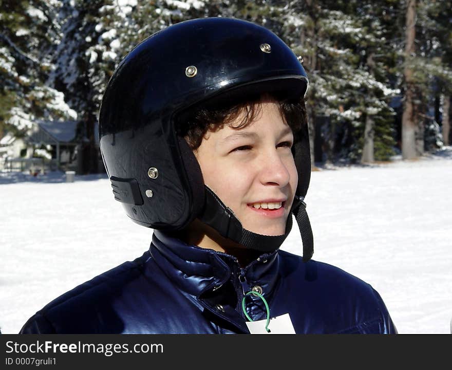 Boy in a helmet in winter