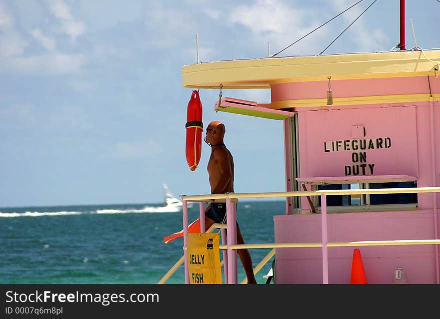 Life gaurd watching for distress swimmers. Life gaurd watching for distress swimmers.