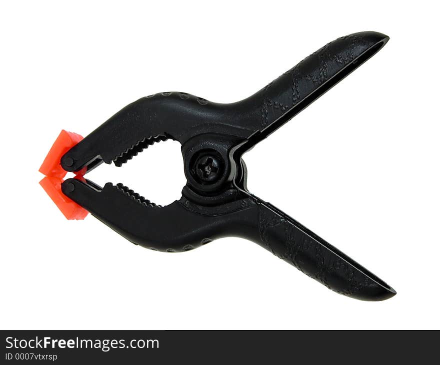 Black and orange plastic 2 1/2 Spring Clamp. shot on white. Black and orange plastic 2 1/2 Spring Clamp. shot on white.