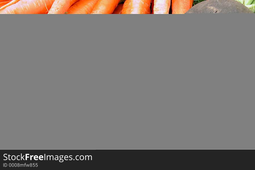 Some carrots and a black radishes-detail. Some carrots and a black radishes-detail