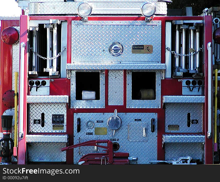 Back of Fire Truck in red and chrome. Back of Fire Truck in red and chrome