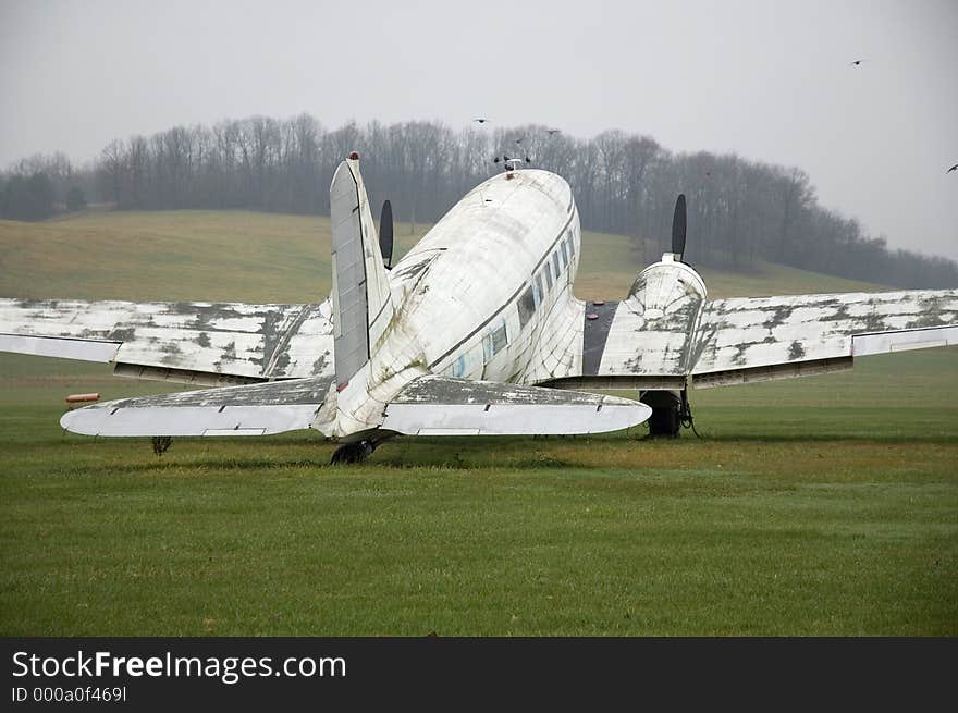 A retired plane sits idle in a field used as a runway in rural Ohio. A retired plane sits idle in a field used as a runway in rural Ohio