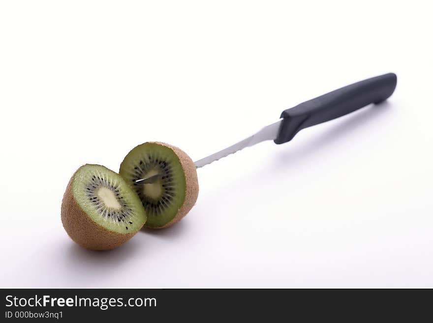 A pair of Sliced kiwi knifed at its core