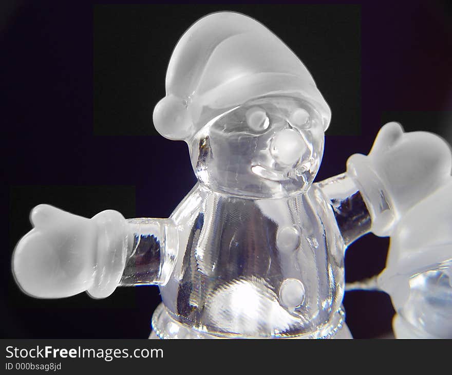 Glass Snowman Isolated on black background