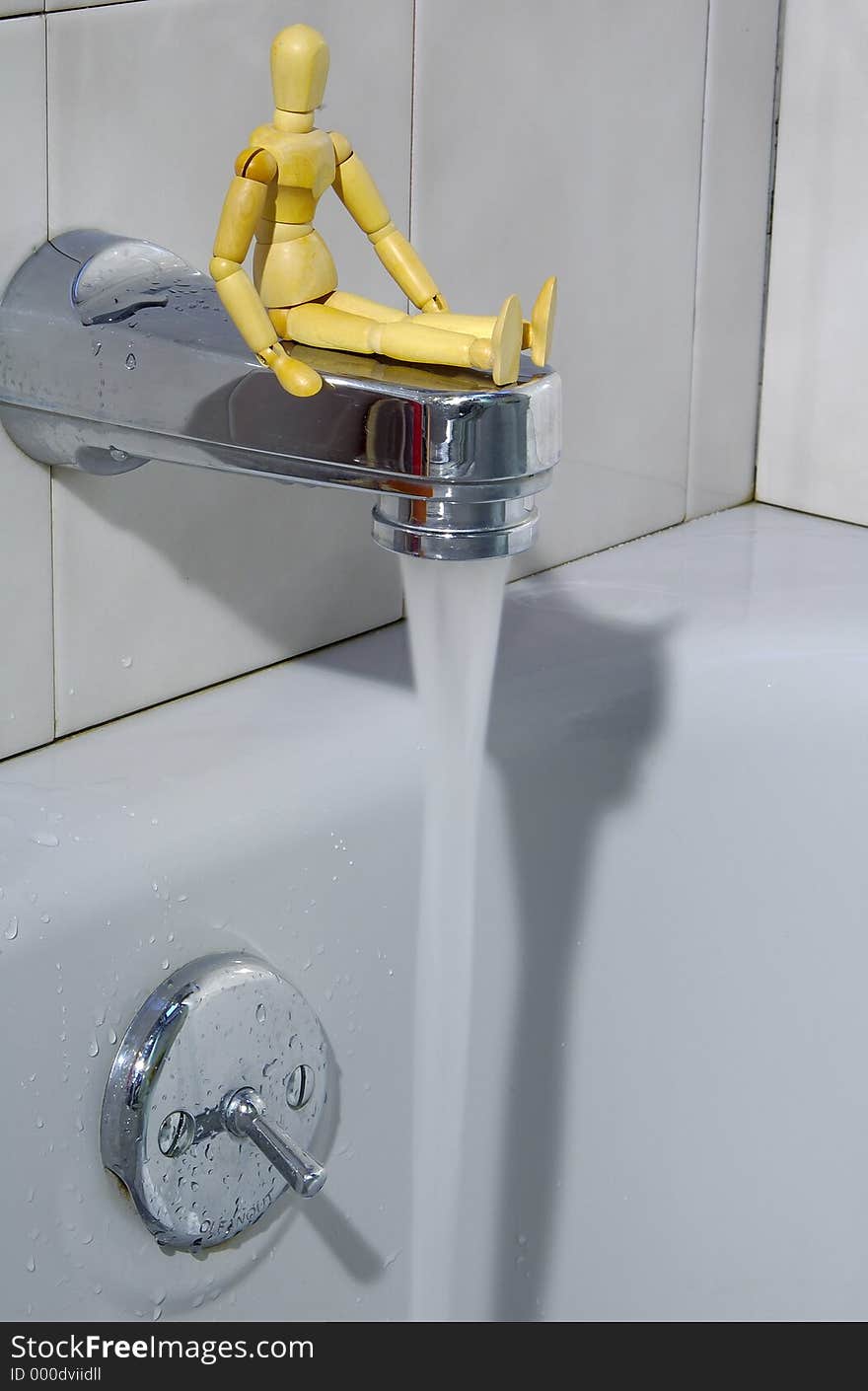 Mannequin Sitting on a Tub Spout. Mannequin Sitting on a Tub Spout