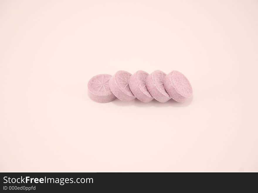 Five pink candies