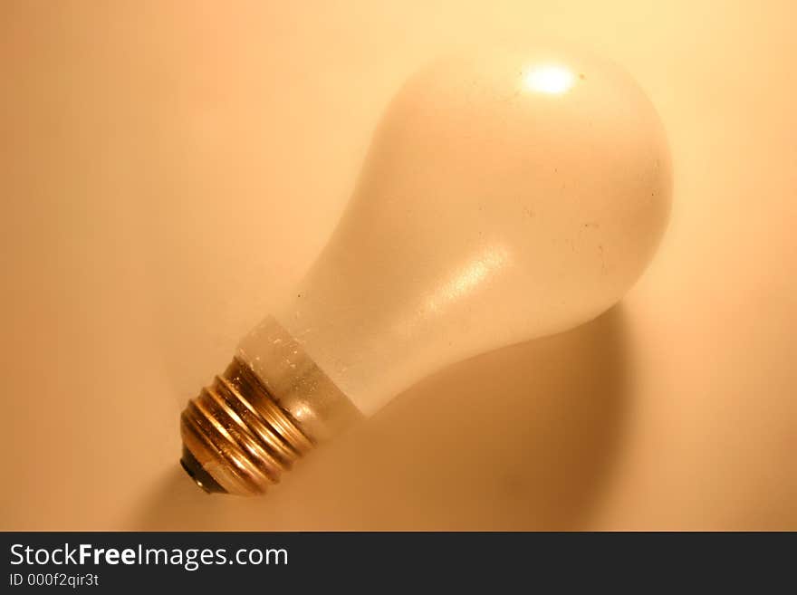 Lightbulb out of socket on its side. Lightbulb out of socket on its side.