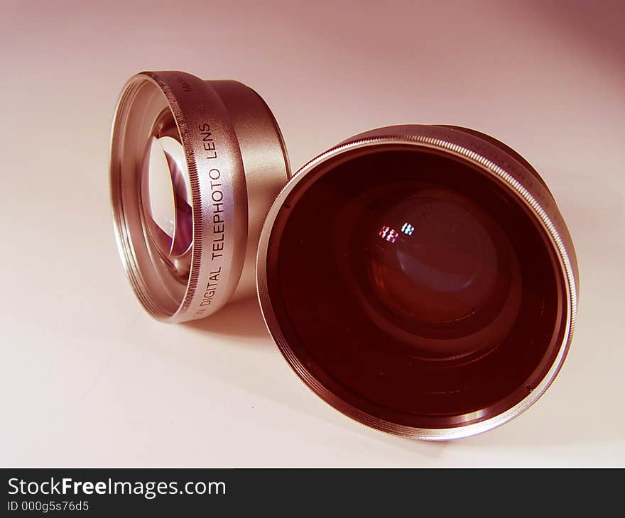 Two camera lens Isolated on white background with blue tint