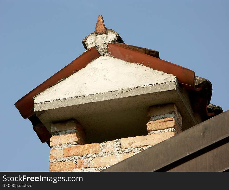 Restored, old farm building chimney