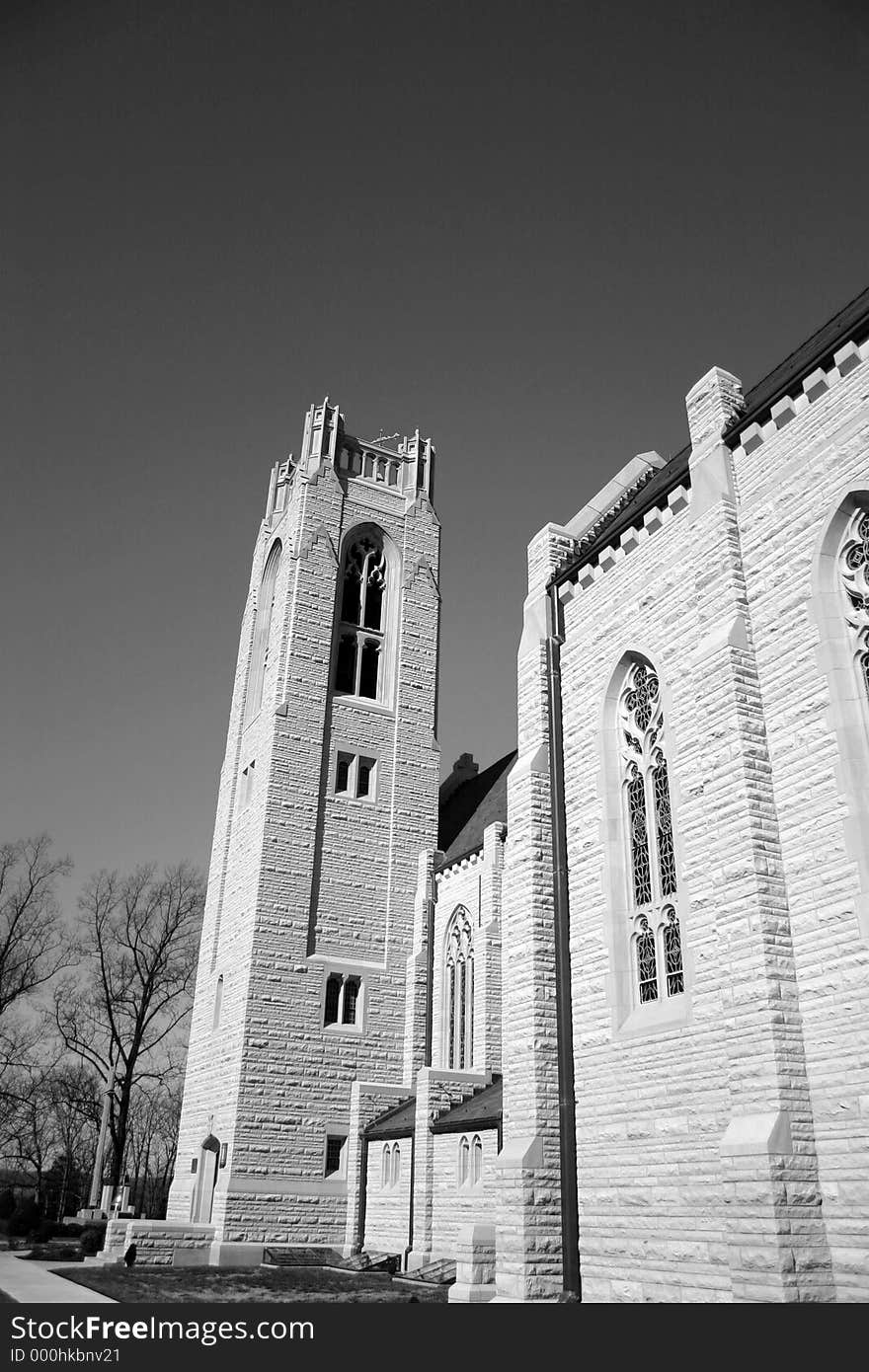 A black & white image of an old church bell tower