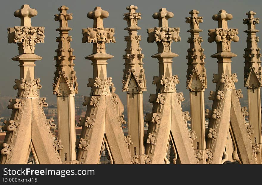 Close up of the spires in Milans Gothic masterpiece, the rood of the Duomo, dating back to 1386. Close up of the spires in Milans Gothic masterpiece, the rood of the Duomo, dating back to 1386