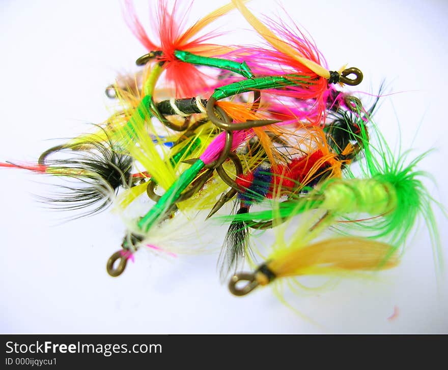 Macro image of a group of custom hand-tied trout flies. Macro image of a group of custom hand-tied trout flies.