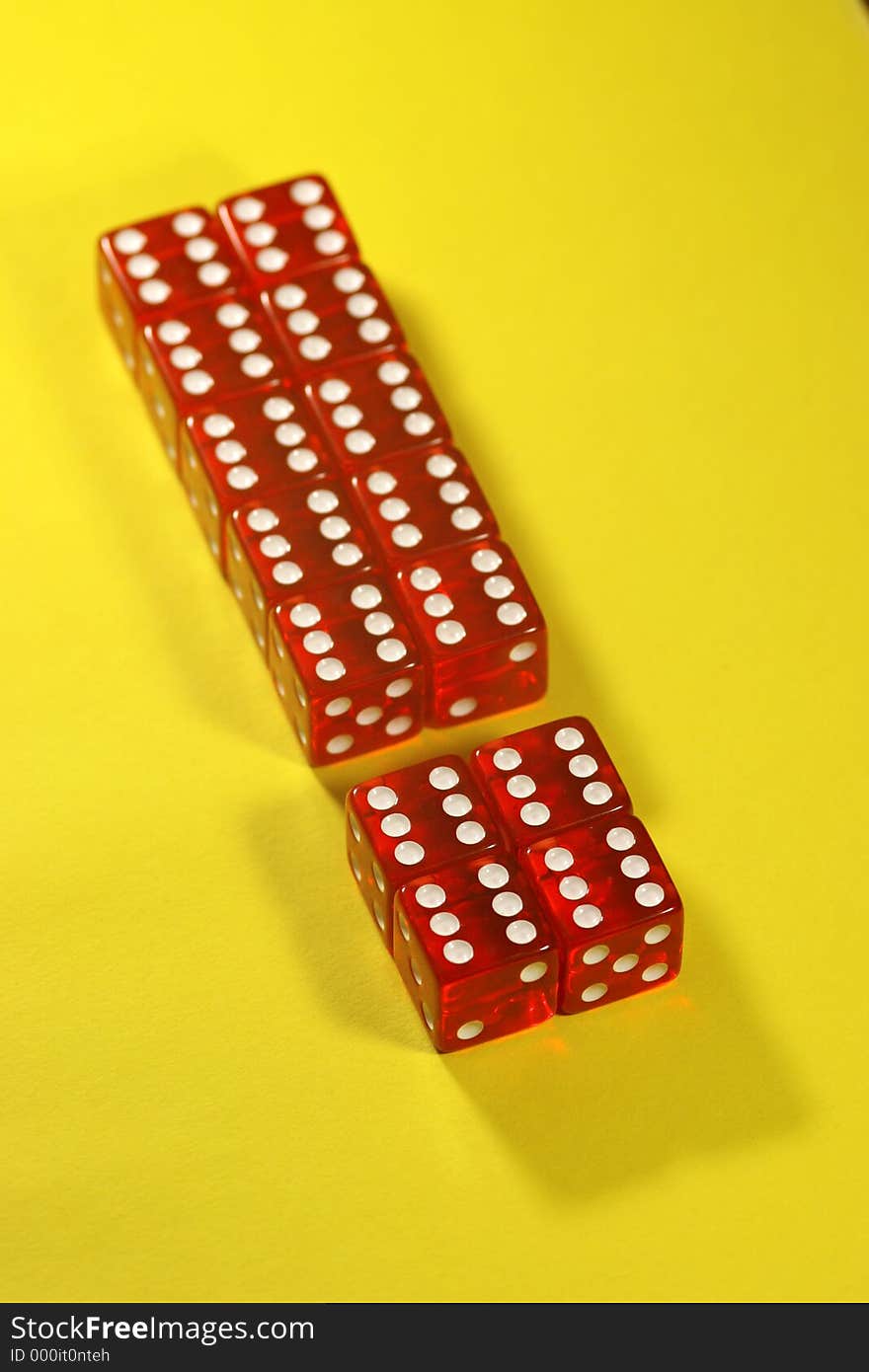 Exclamation mark made out of red dices on yellow backround. Exclamation mark made out of red dices on yellow backround