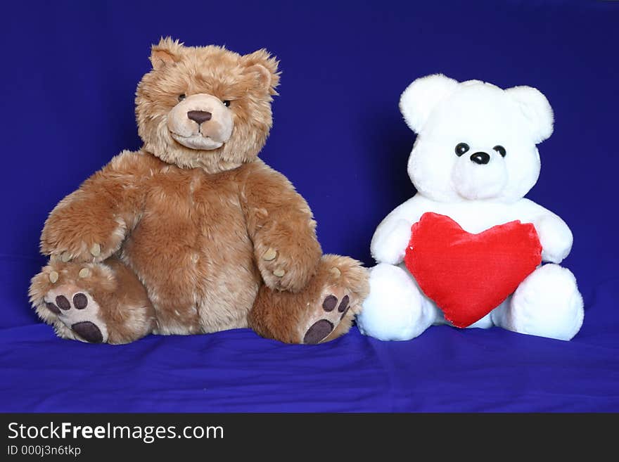 Brown and white teddy bears. Could be used where inter racial love/marriage related materials. Brown and white teddy bears. Could be used where inter racial love/marriage related materials.