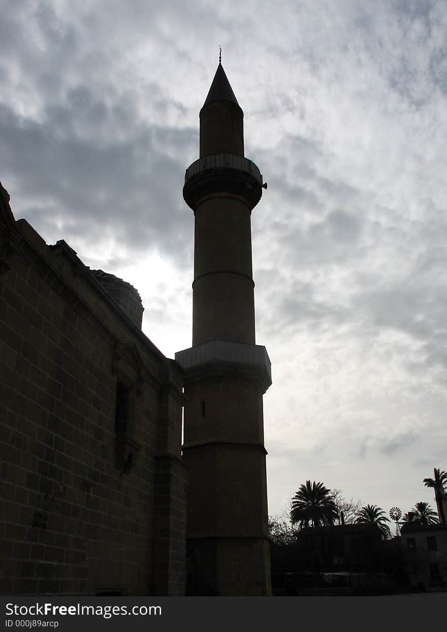 The tower of a mosque hiding the sun. Nicosia. Cyprus. The tower of a mosque hiding the sun. Nicosia. Cyprus