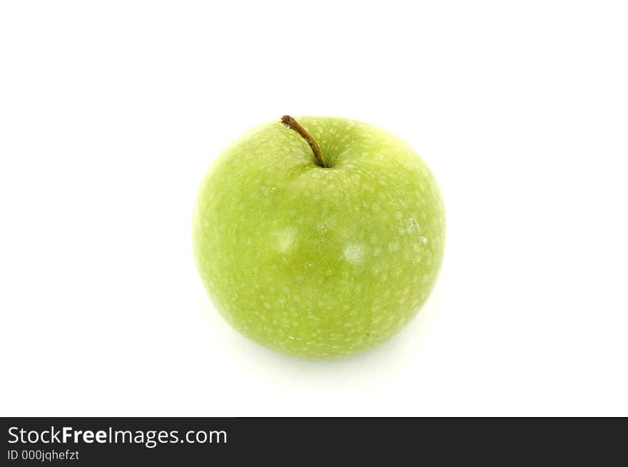 An isolated green apple on white background