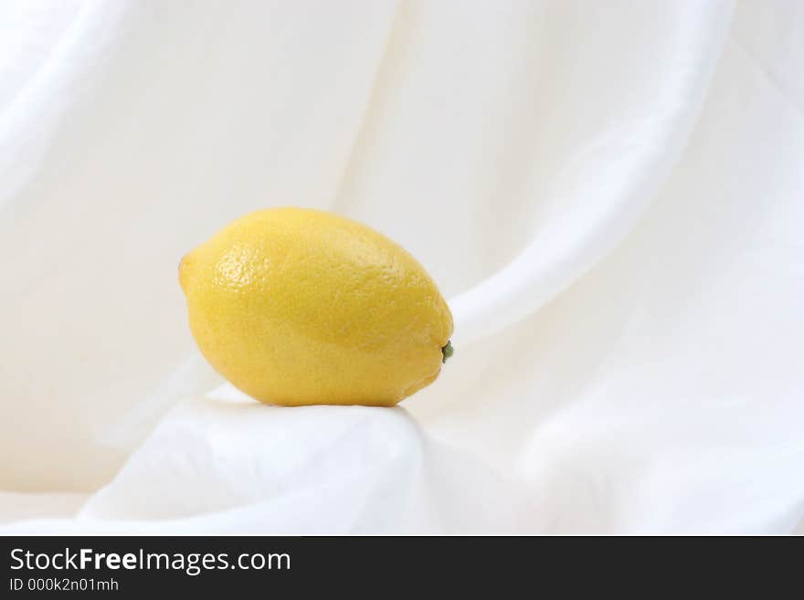 Lemon on silk backdrop