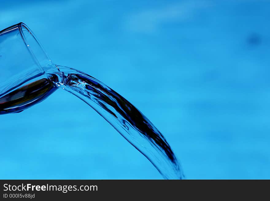 Water pouring out of glass