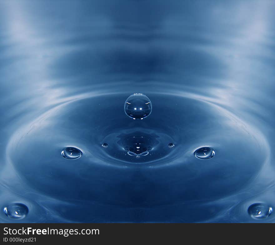 Water drop hovering above the surface. Water drop hovering above the surface