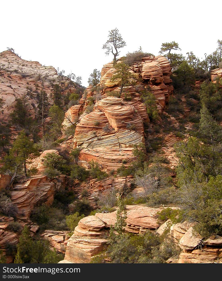 Unusual rock formations at Zion National Park in Utah. The rich colors and striations make this a fascinating place for geologists. Unusual rock formations at Zion National Park in Utah. The rich colors and striations make this a fascinating place for geologists.