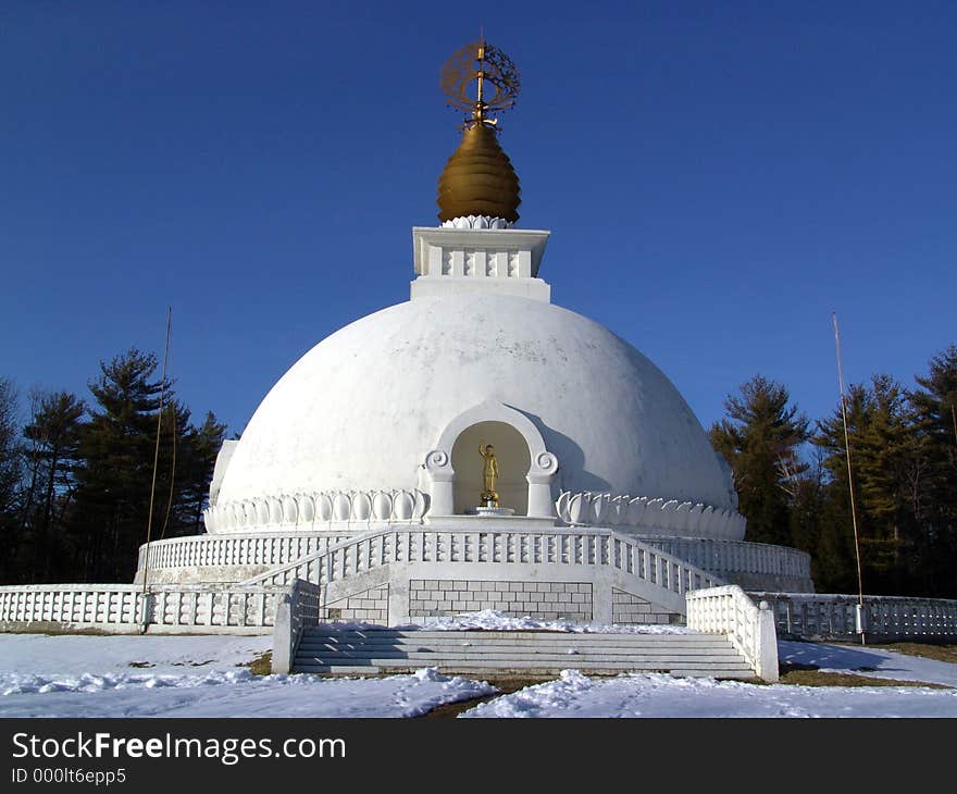 Full frontal view of the peace pagoda located in leverett, massachusetts in winter. Full frontal view of the peace pagoda located in leverett, massachusetts in winter