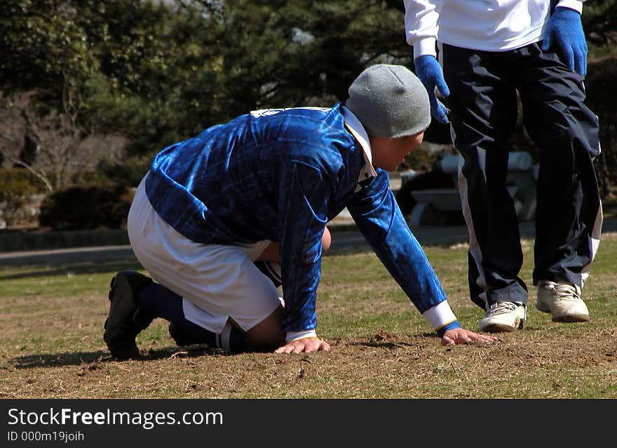 An accident during a soccer game. An accident during a soccer game