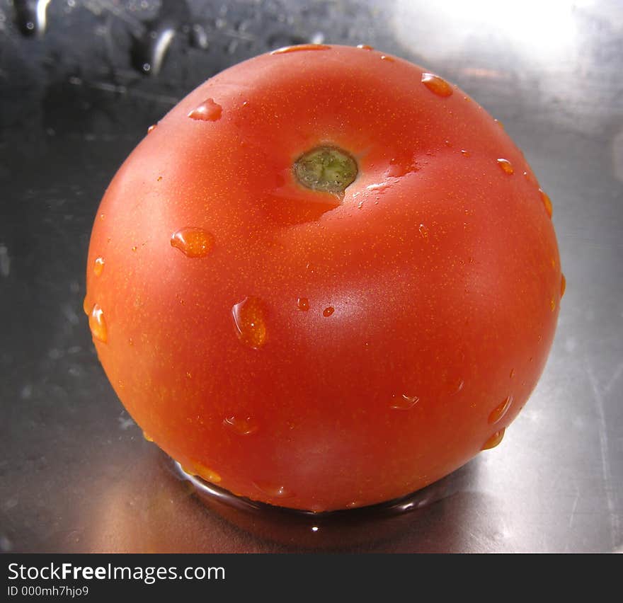 Freshly washed tomato