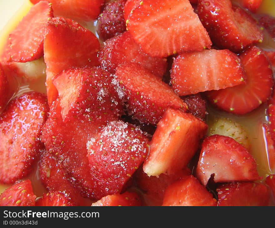 Strawberries sliced with sugar. Strawberries sliced with sugar