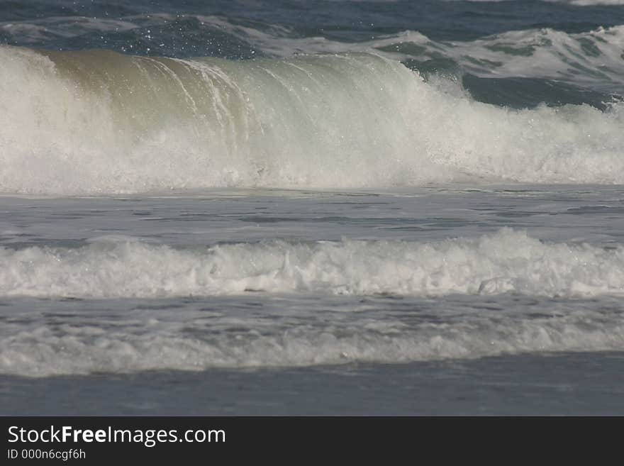 Large waves crashing on shore. Large waves crashing on shore.