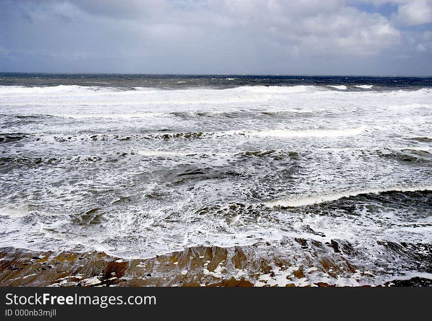 Seascape with waves and white surf