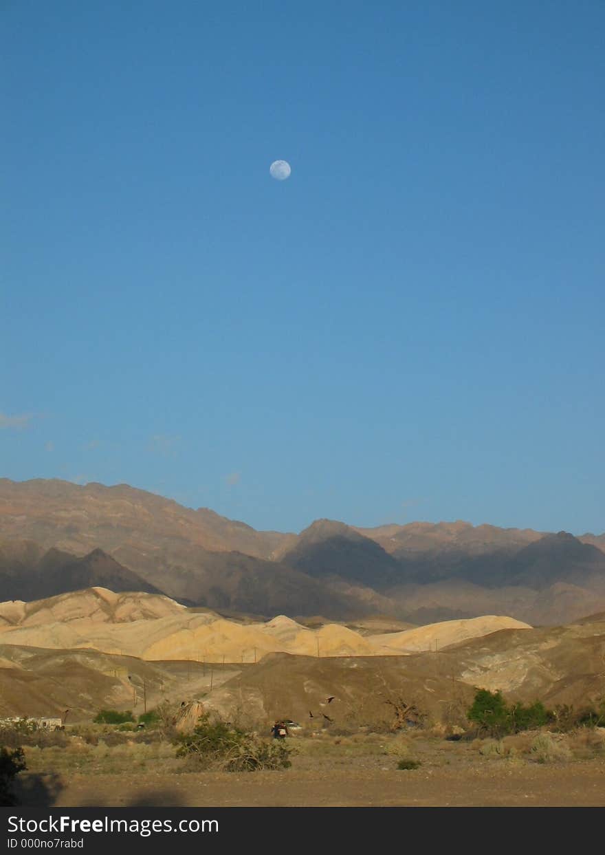 Death Valley under the moon and sun light