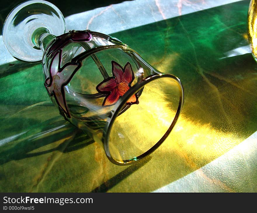 Still life of a wine glass playing with light and shadows. Still life of a wine glass playing with light and shadows.