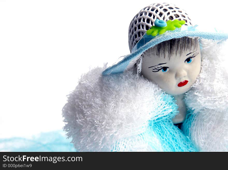 Doll face over white background