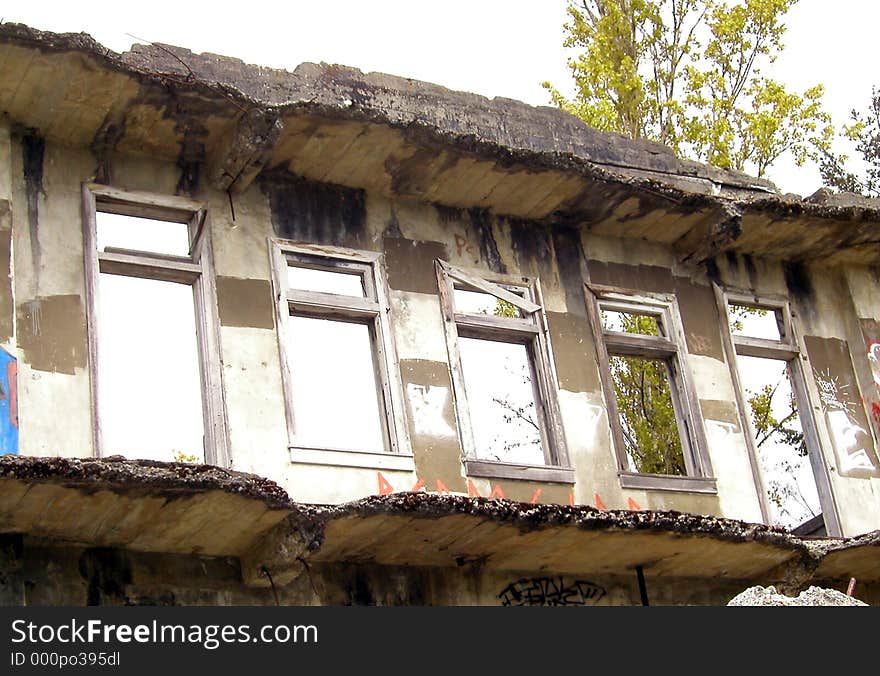 Several windows look out of a surviving wall of the old Western Washington State Mental Hospital in Steilacoom, WA. Several windows look out of a surviving wall of the old Western Washington State Mental Hospital in Steilacoom, WA.