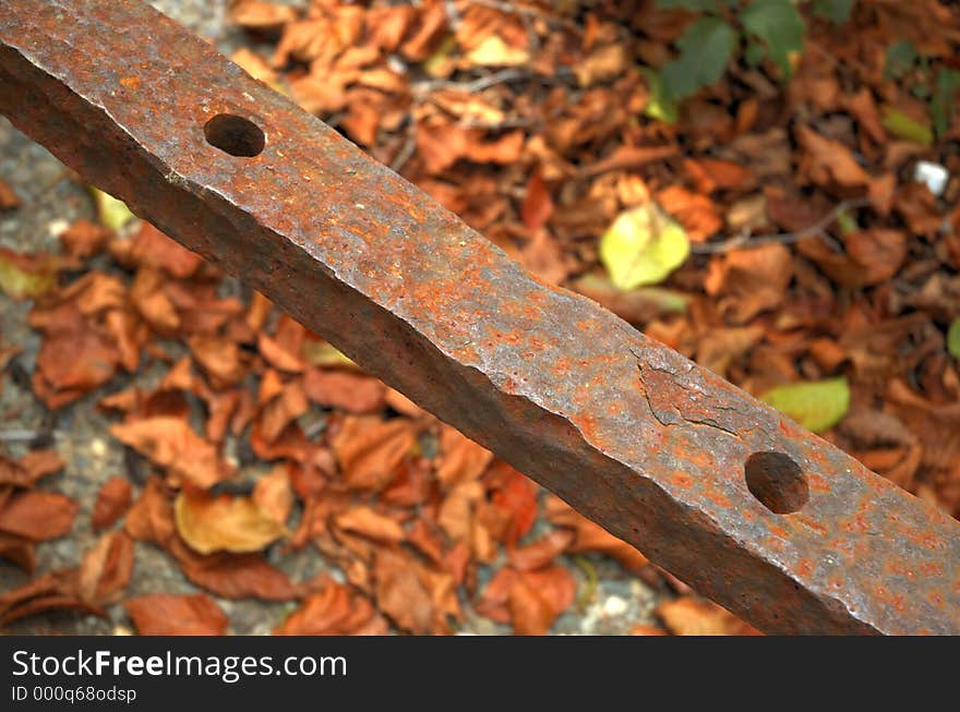 Iron bar with holes