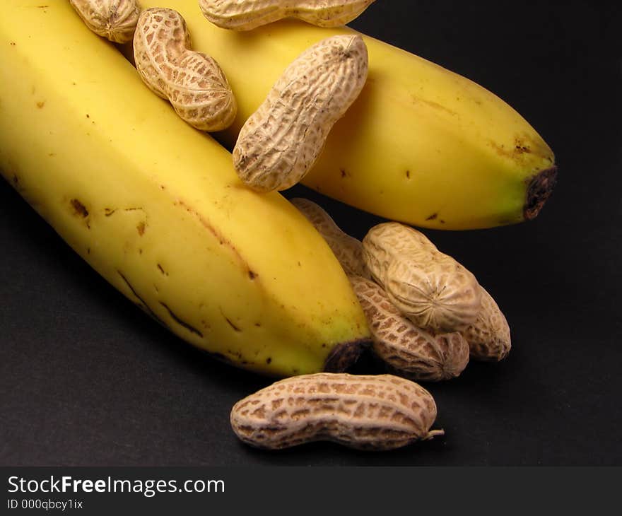 Still life with bananas and peanuts. Still life with bananas and peanuts