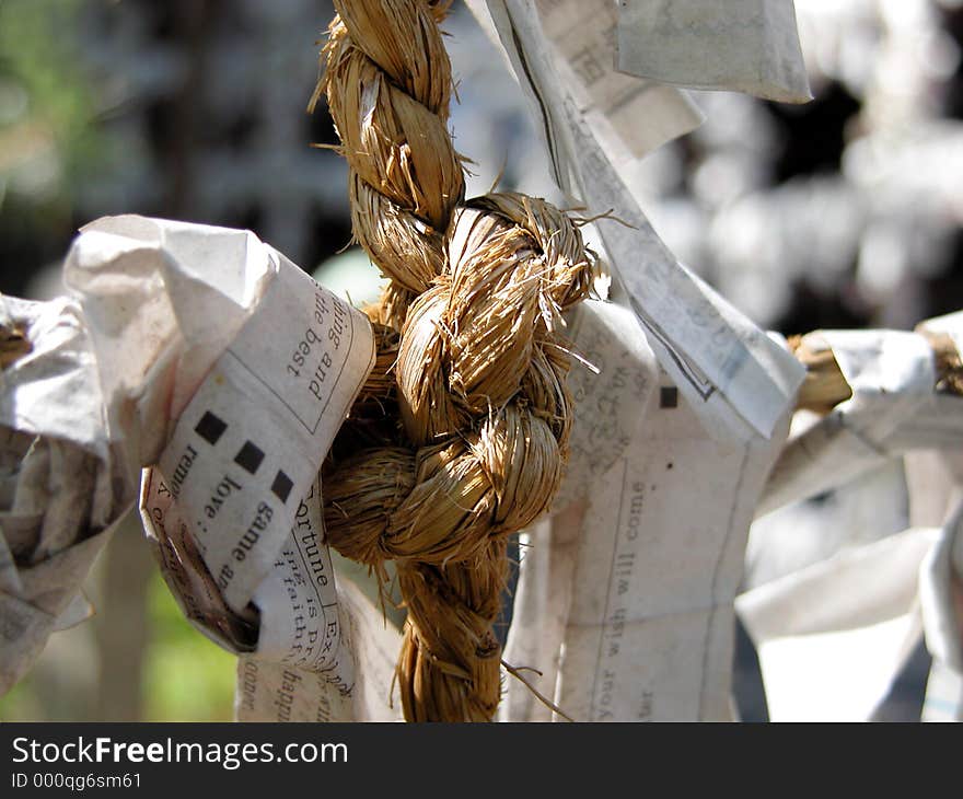 Wishing papers-detail in a Japanese temple yard