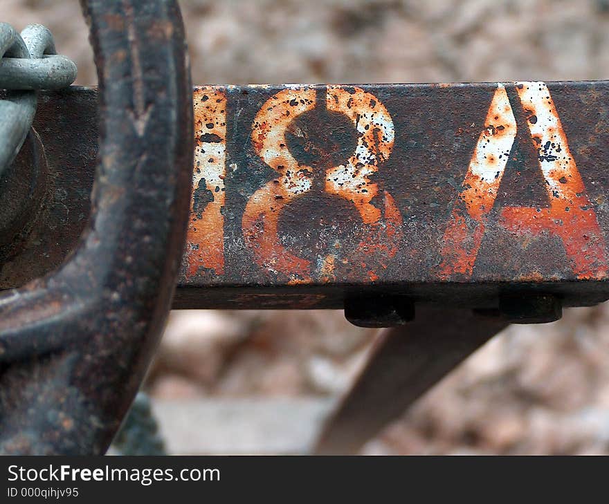 Old rusty spray paint on a valve. Old rusty spray paint on a valve