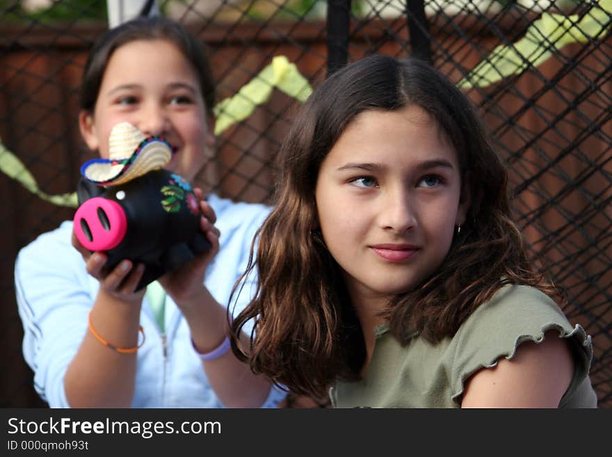 Girl showing her present. Girl showing her present